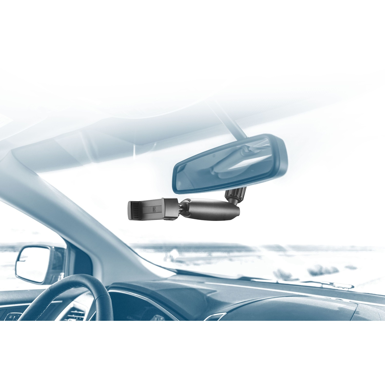 Interni auto con dashcam montata sul parabrezza. Specchietto retrovisore e cruscotto visibili.