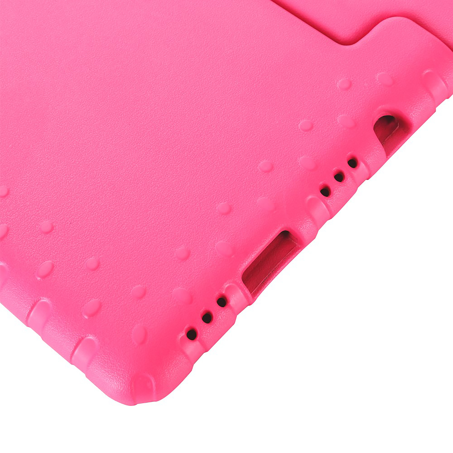 A close-up shot of a pink tablet case with holes and dots.