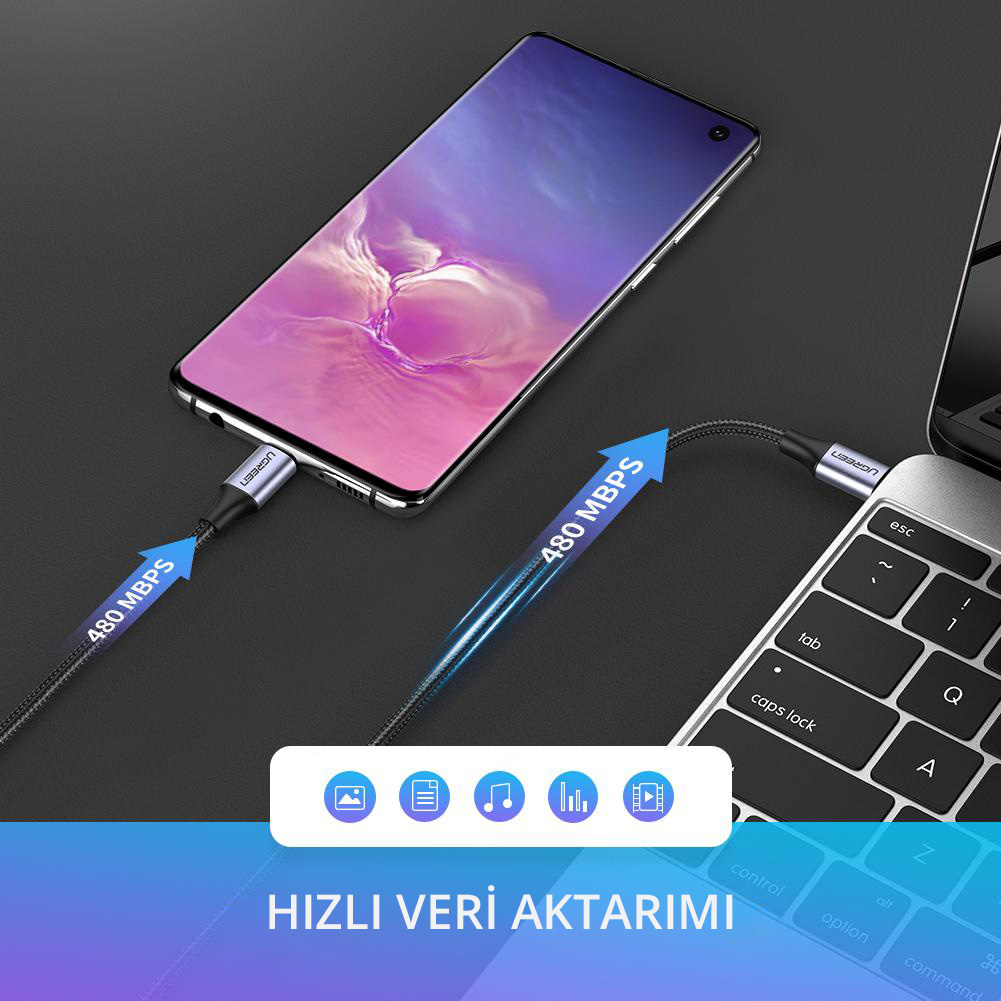Siyah bir kabloyla bir dizüstü bilgisayara bağlı bir telefon. Oklar 480 Mbps veri aktarımını gösteriyor.
