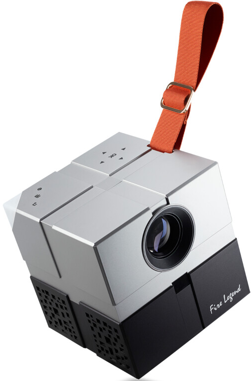 Projecteur argenté et noir en forme de cube avec une sangle orange et texte Fire Legend.
