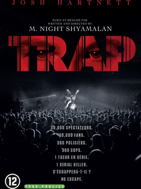 Couverture du film 'Trap' avec une foule, des lumières de scène et un visage au centre.
