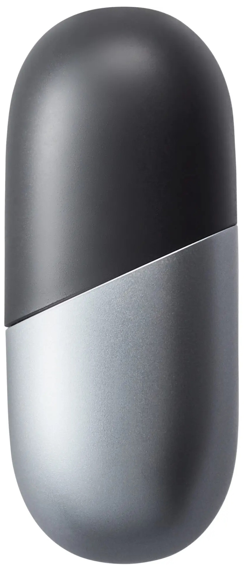 Dwutonowe, szaro-srebrne urządzenie w kształcie kapsułki, podzielone po przekątnej.