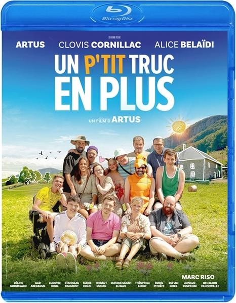 DVD-hoes van 'Un P'tit Truc En Plus', met een groep mensen die op het gras zitten.