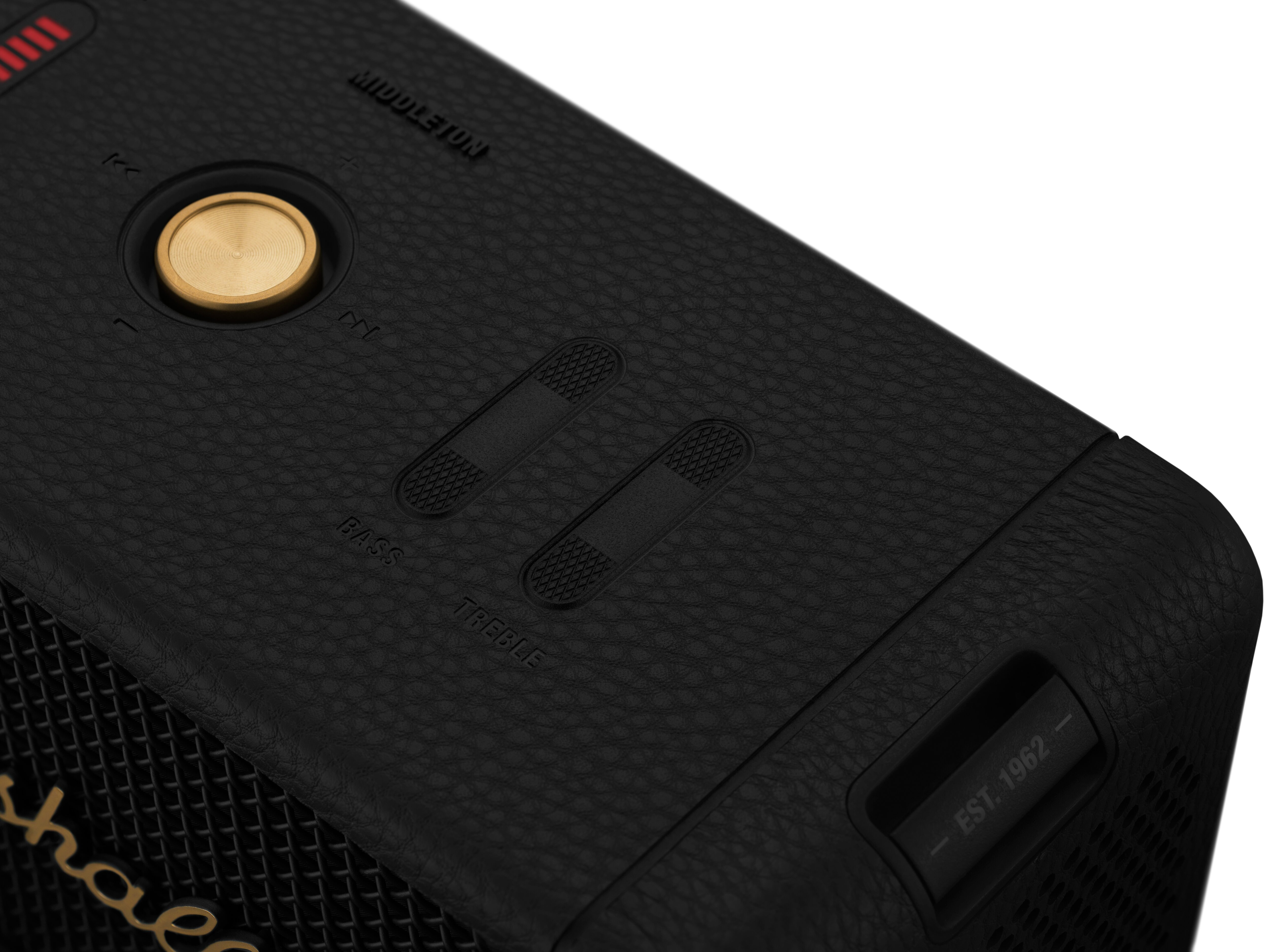 Zbliżenie czarnego głośnika ze złotymi przyciskami i logo Marshall.