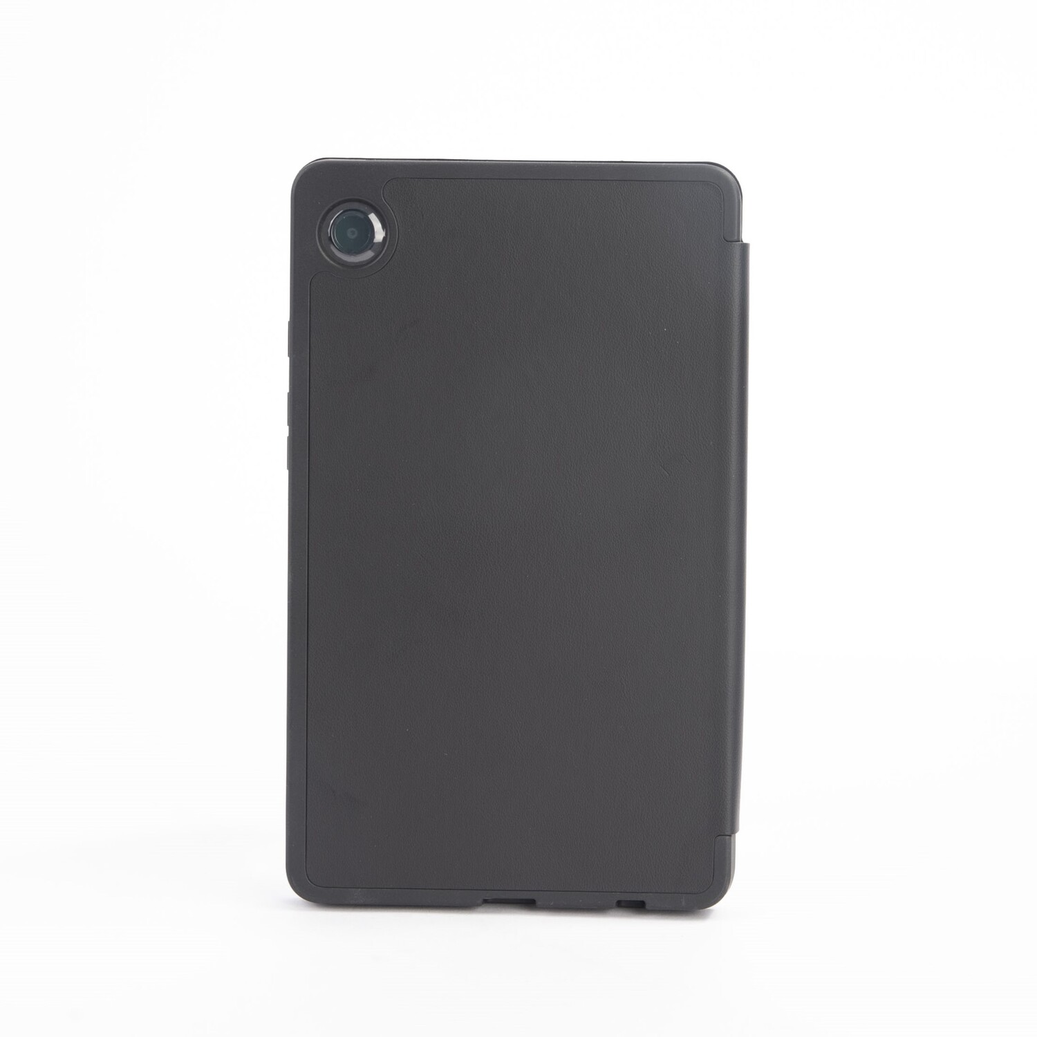 A black tablet case, closed, with a camera lens visible. The case has a smooth texture on a white background.