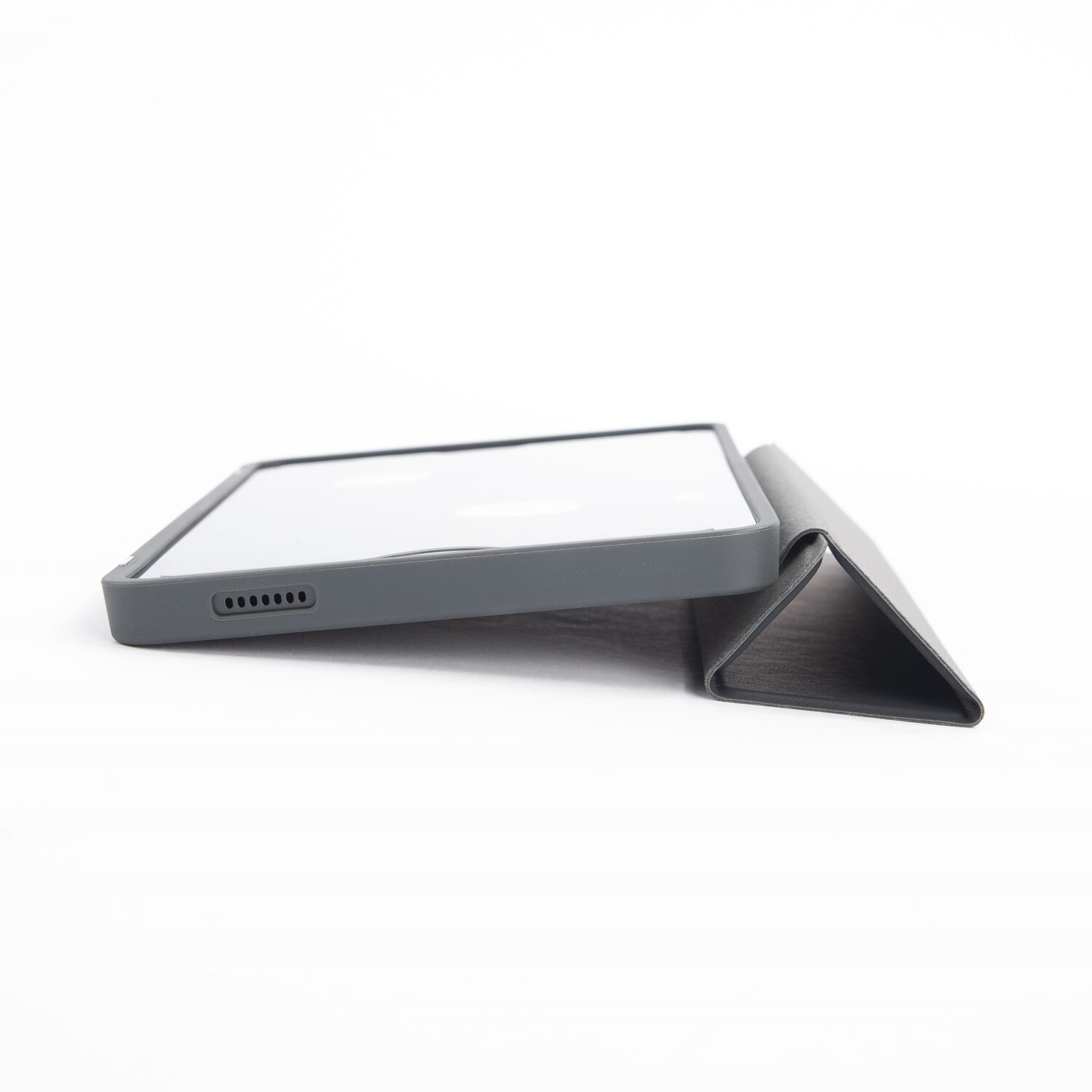 A gray tablet with a cover folded into a triangle, set against a white background.