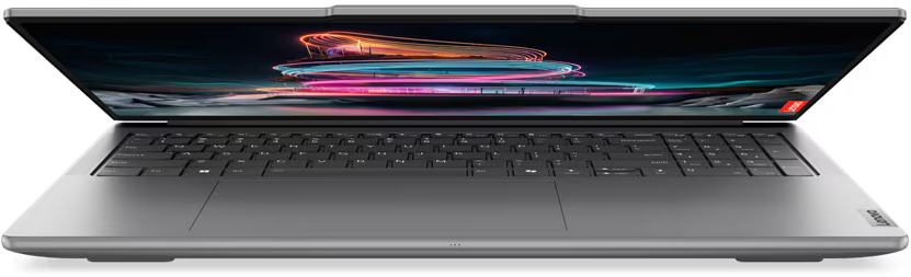Nyitott laptop, felfelé néző képernyővel, fekete háttérrel.