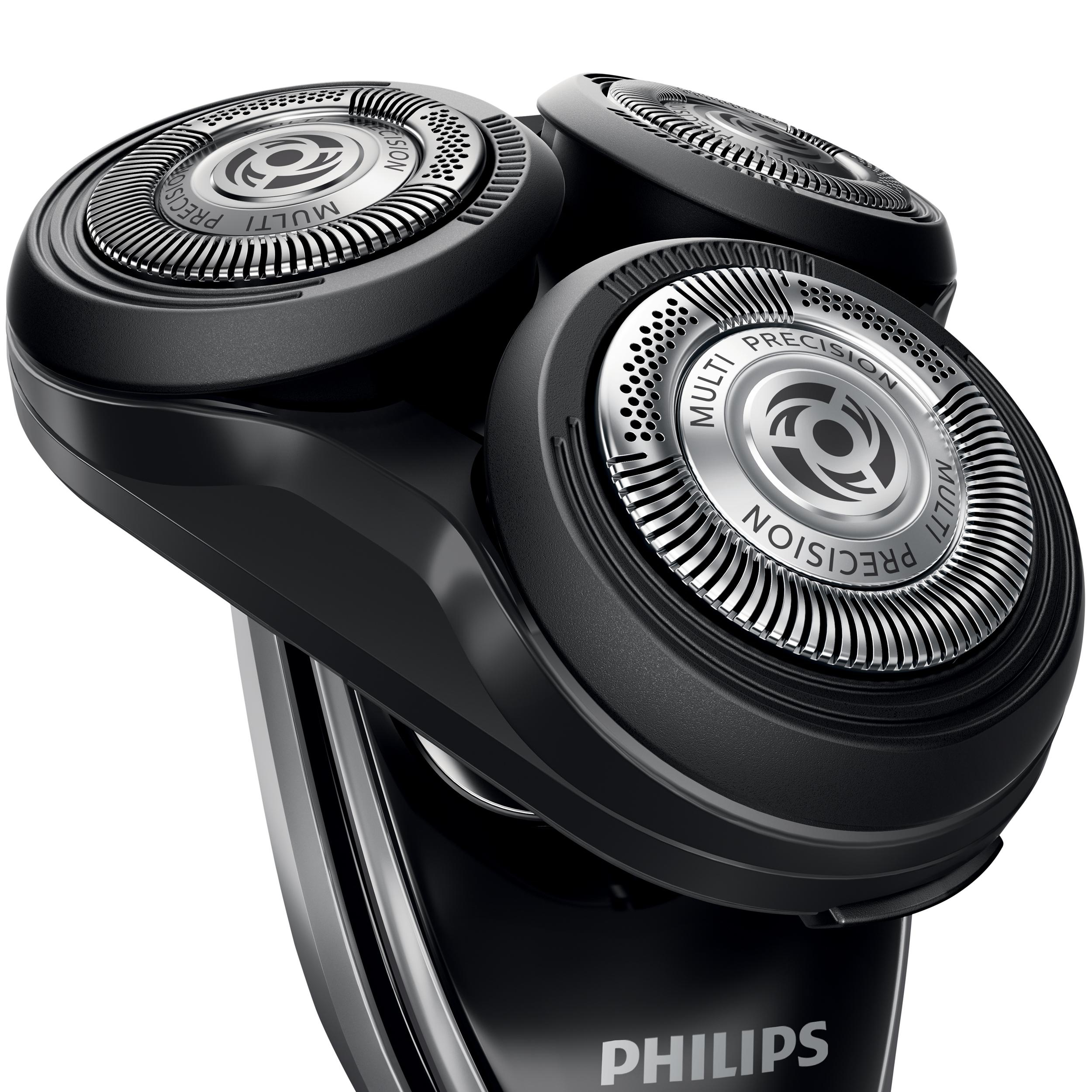 Nahaufnahme eines schwarzen elektrischen Philips-Rasierers mit drei rotierenden Köpfen auf weißem Grund.
