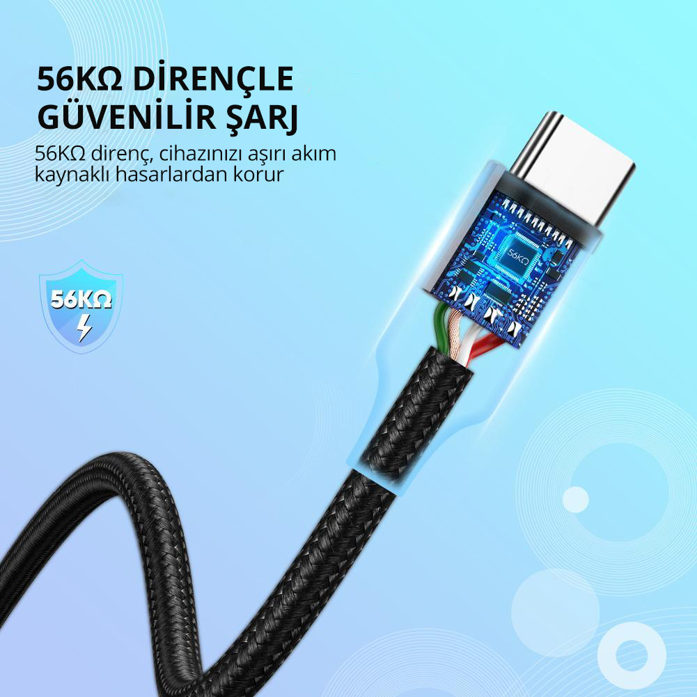 Üstünde bir tasarım olan siyah bir dizüstü bilgisayar, siyah bir arka planda açık.