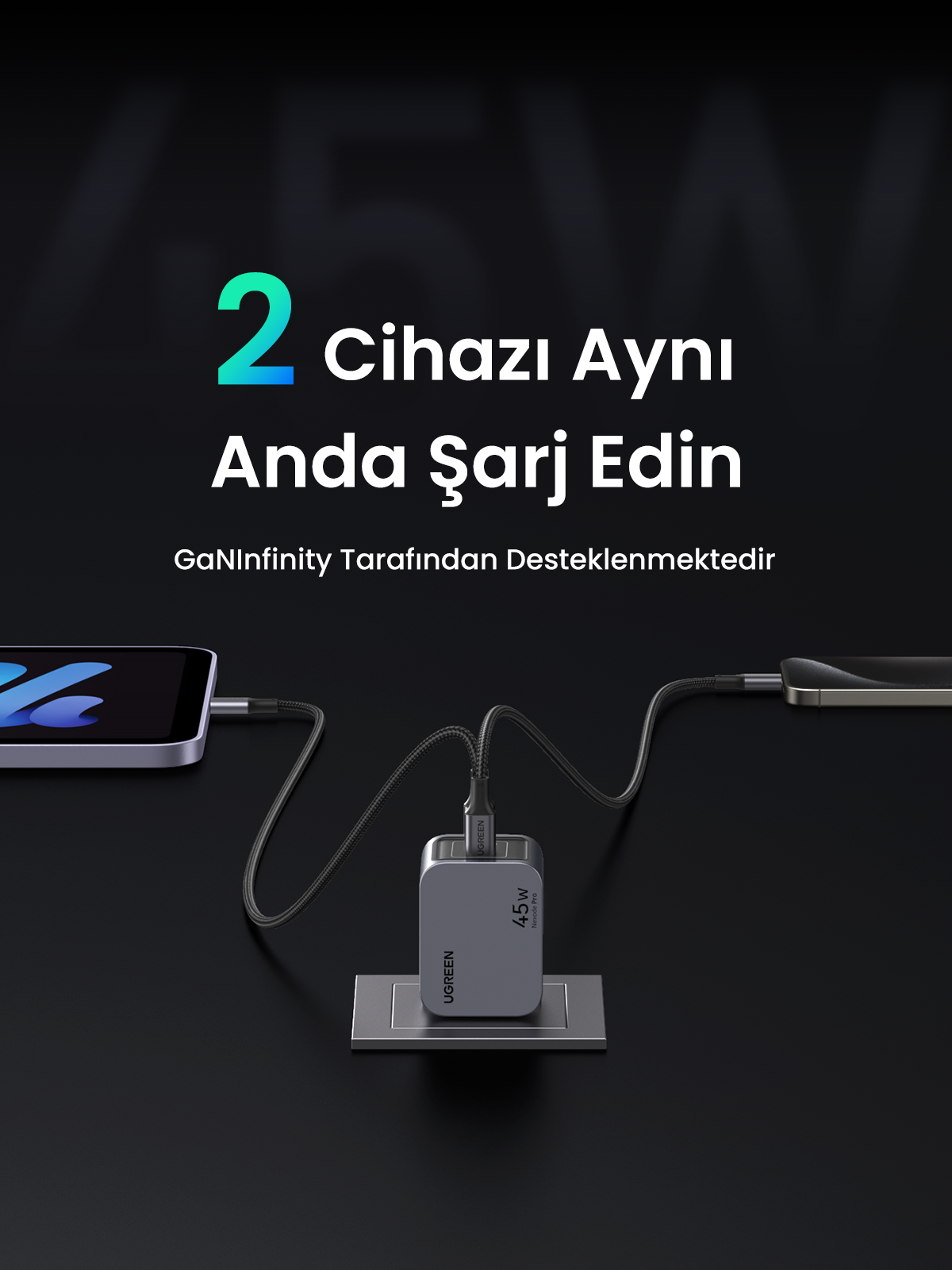 İki kablo ile bir tablet ve telefon şarj eden siyah şarj cihazı. Metin: Aynı anda 2 cihaz.