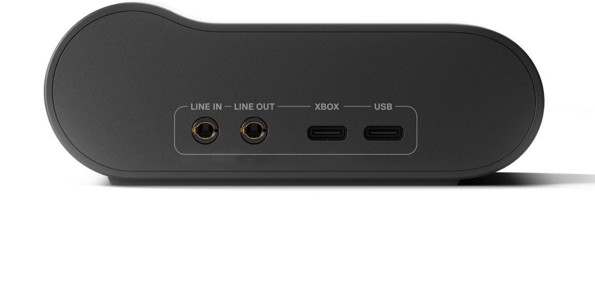 Egy eszköz hátulja, Line in, Line out, Xbox és USB feliratú portokkal.