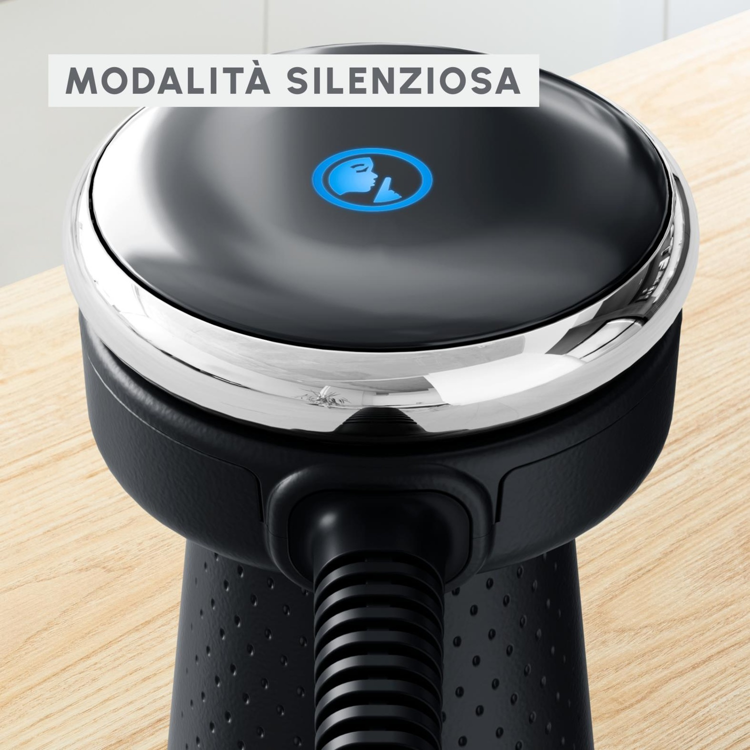 Un dispositivo nero con una parte superiore lucida e un'icona blu, etichettato come 'Modalità silenziosa'.