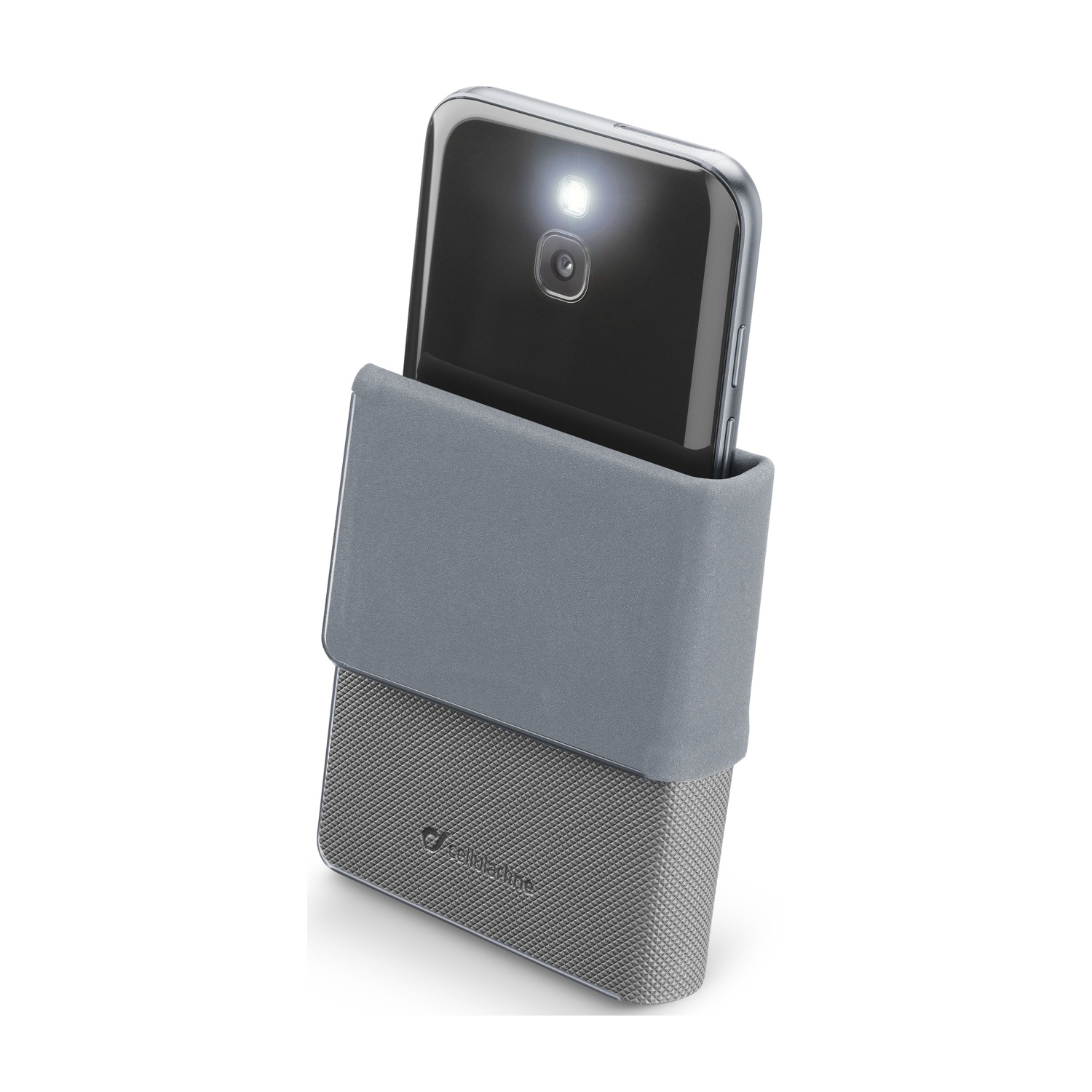 Una custodia grigia per telefono con un telefono. Il telefono è nella custodia e ha il flash della fotocamera acceso.