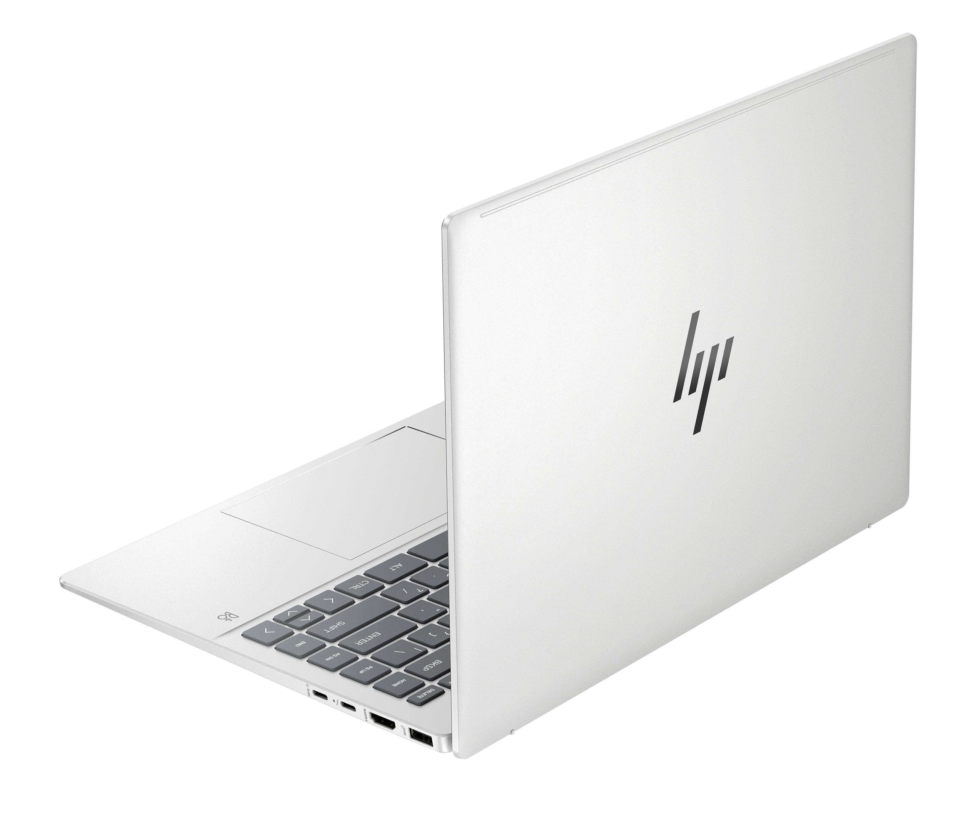 Weißer Laptop, offen, schräge Ansicht, schwarze Tastatur, weißer Hintergrund.