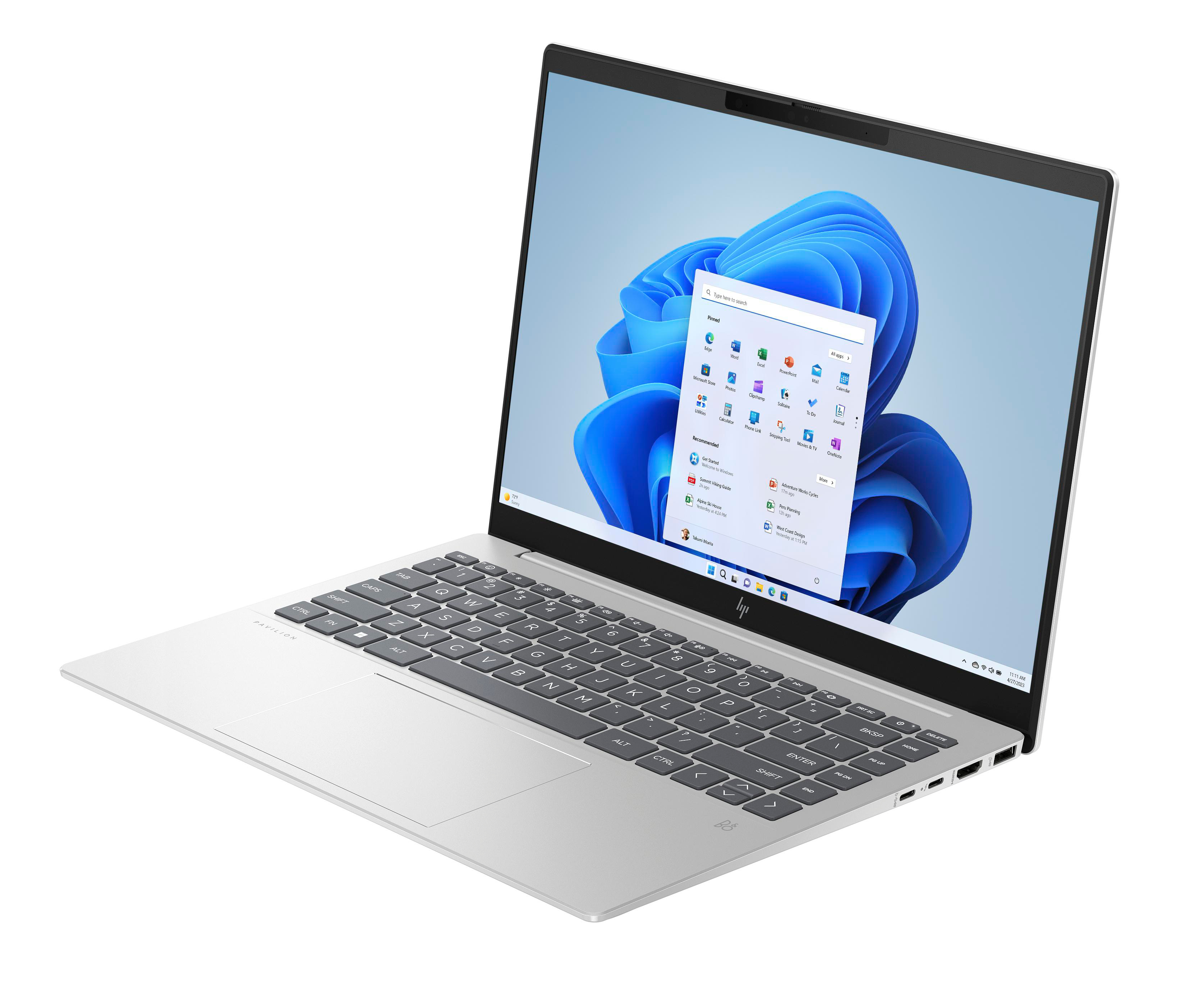 Ein silberner Laptop mit einem Bildschirm, der eine Windows-Oberfläche zeigt, offen auf einem Tisch.