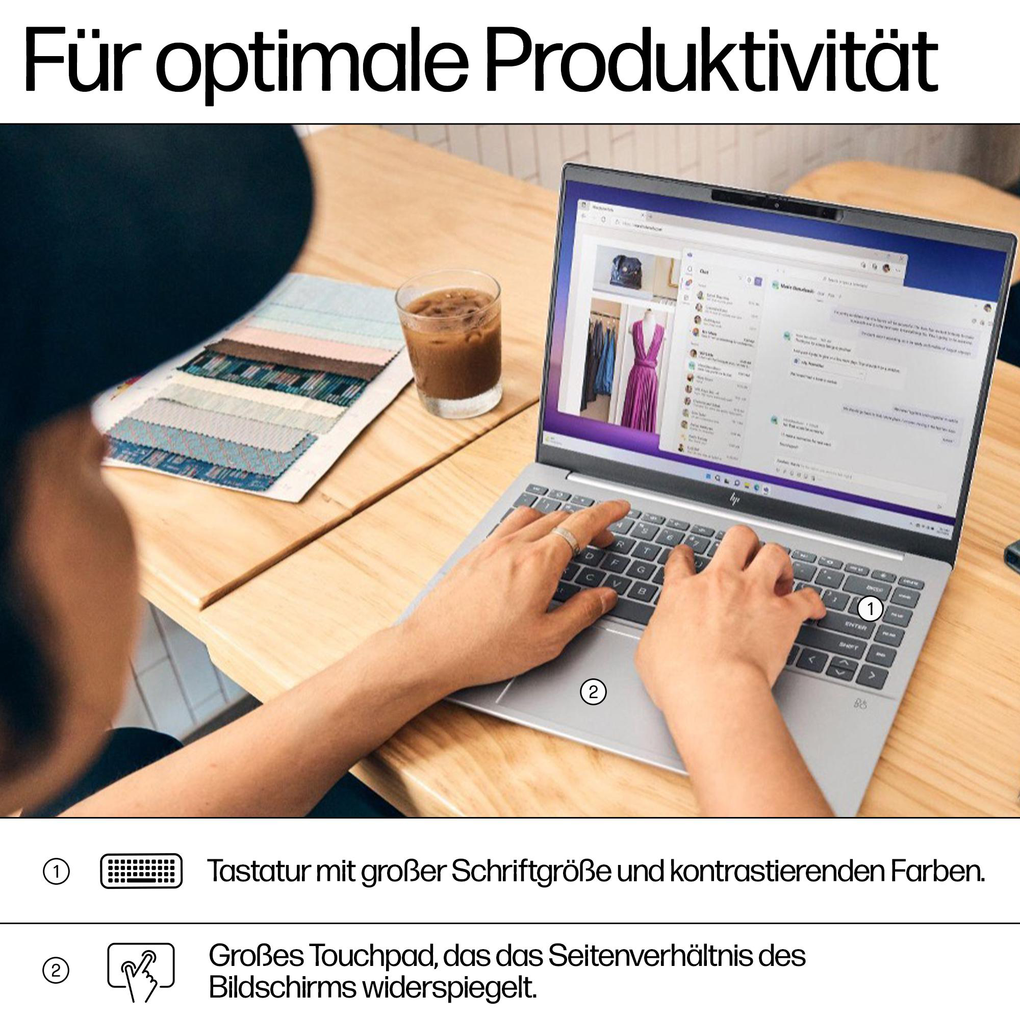 Hände tippen auf einer Laptop-Tastatur. Fenster mit Webseite auf dem Bildschirm.