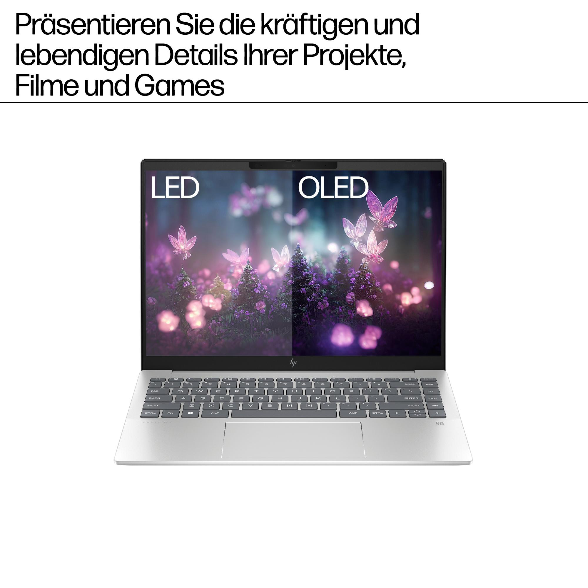Silberner Laptop mit geteiltem Bildschirm, LED- und OLED-Anzeige, weiße Tastatur.