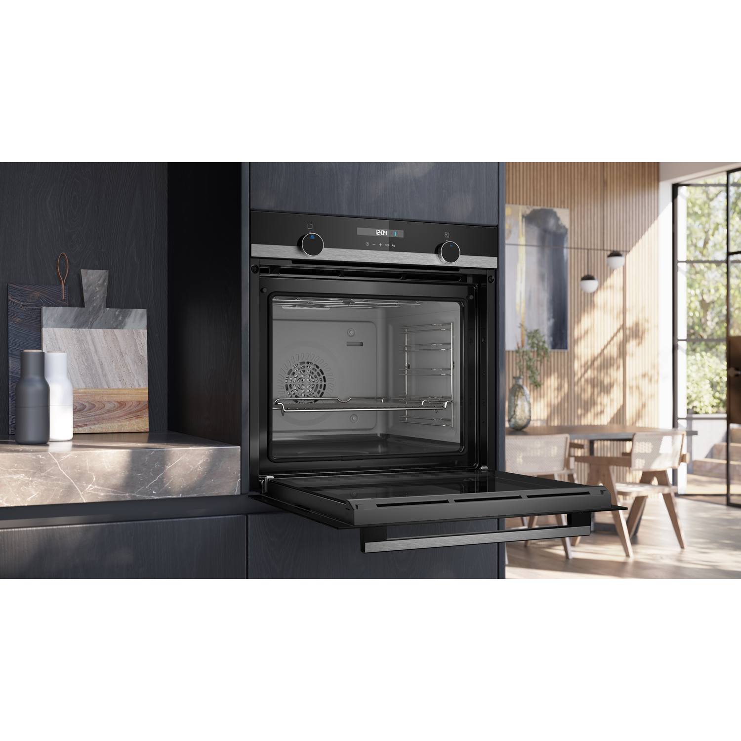 Oven with the door open, showing the inside.