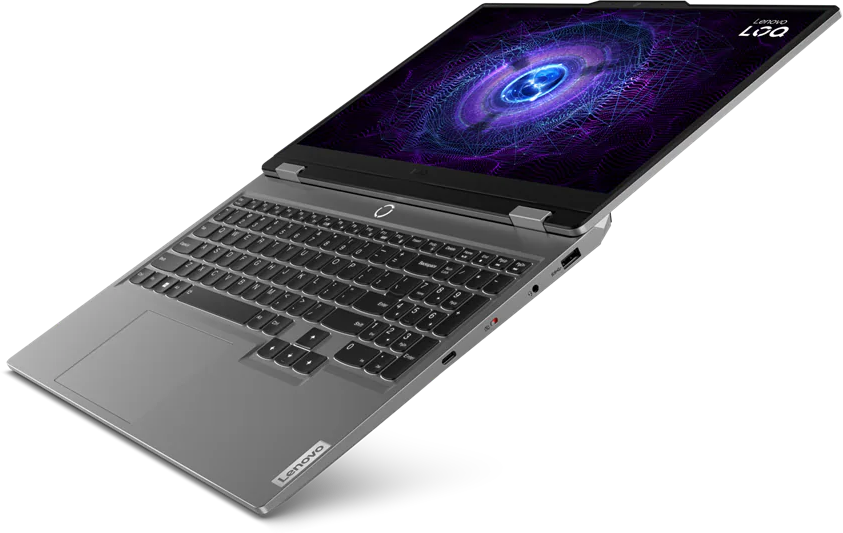 Laptop nyitott képernyővel. A képernyő lila és kék színekkel jeleníti meg a dizájnt. Lenovo logó.