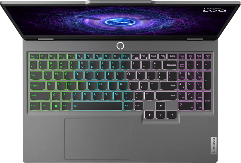 Laptop billentyűzet felülről. Többszínű gombok, a Lenovo logó látható. Sötét háttér.
