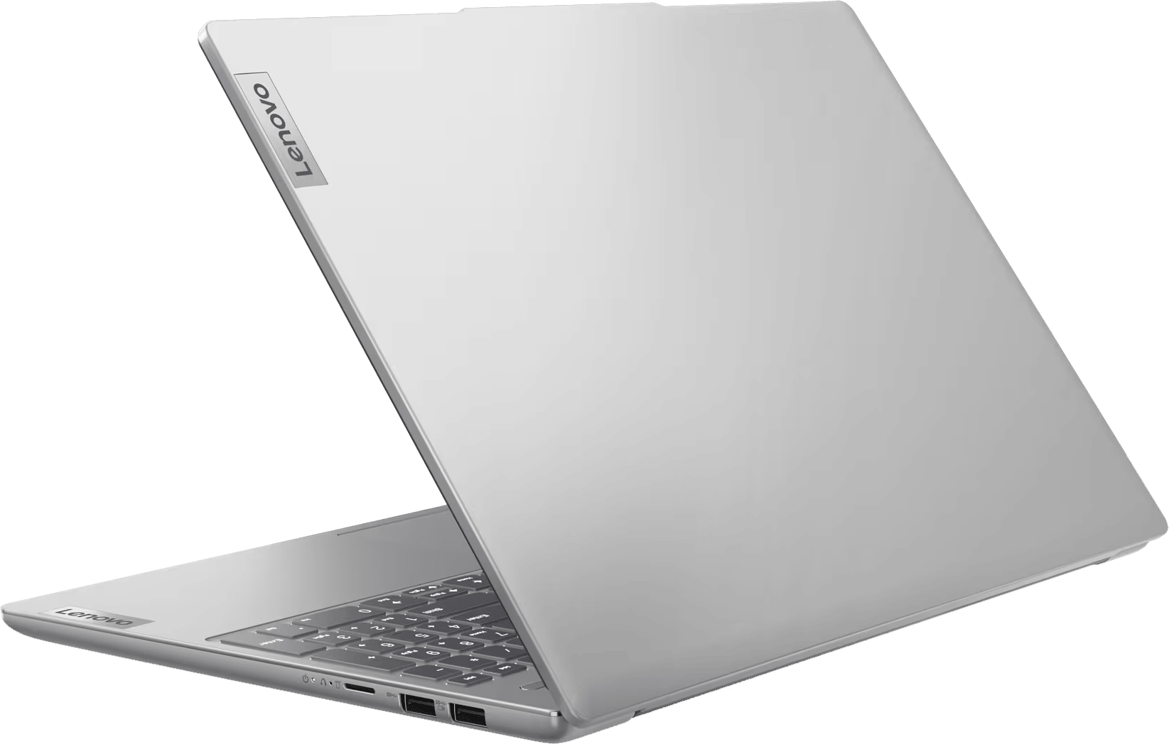 Ezüst laptop Lenovo logóval, félig nyitva. A billentyűzet látható.