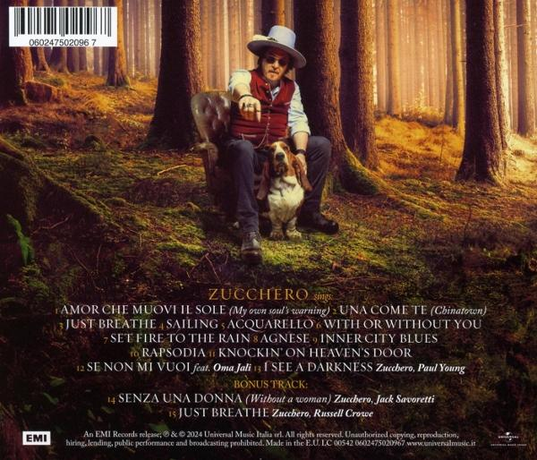 Rückseite eines Zucchero-Albums. Ein Mann mit Hund sitzt im Wald. Text auf dem Album.