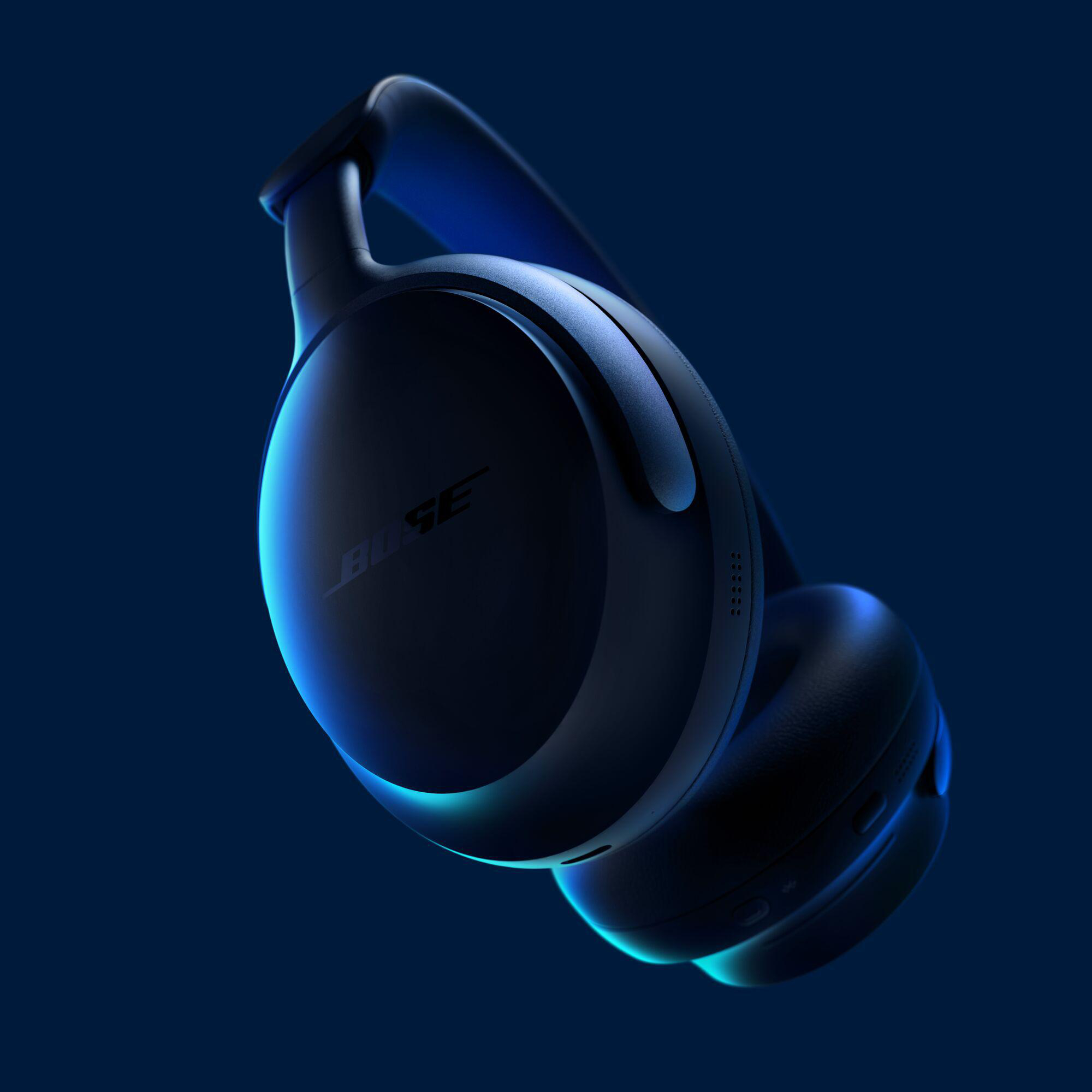 Schwarzer Bose-Kopfhörer mit blauem Farbverlauf, der das Produkt hervorhebt.