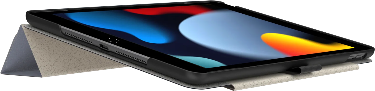 Tablet fekete tokban, felállítva. A háttér egy elmosódott, zöld és kék jelenet.