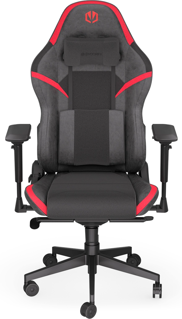 Egy fekete és piros gamer szék. Fejtámlája és karfája van. A háttér sötét színű.