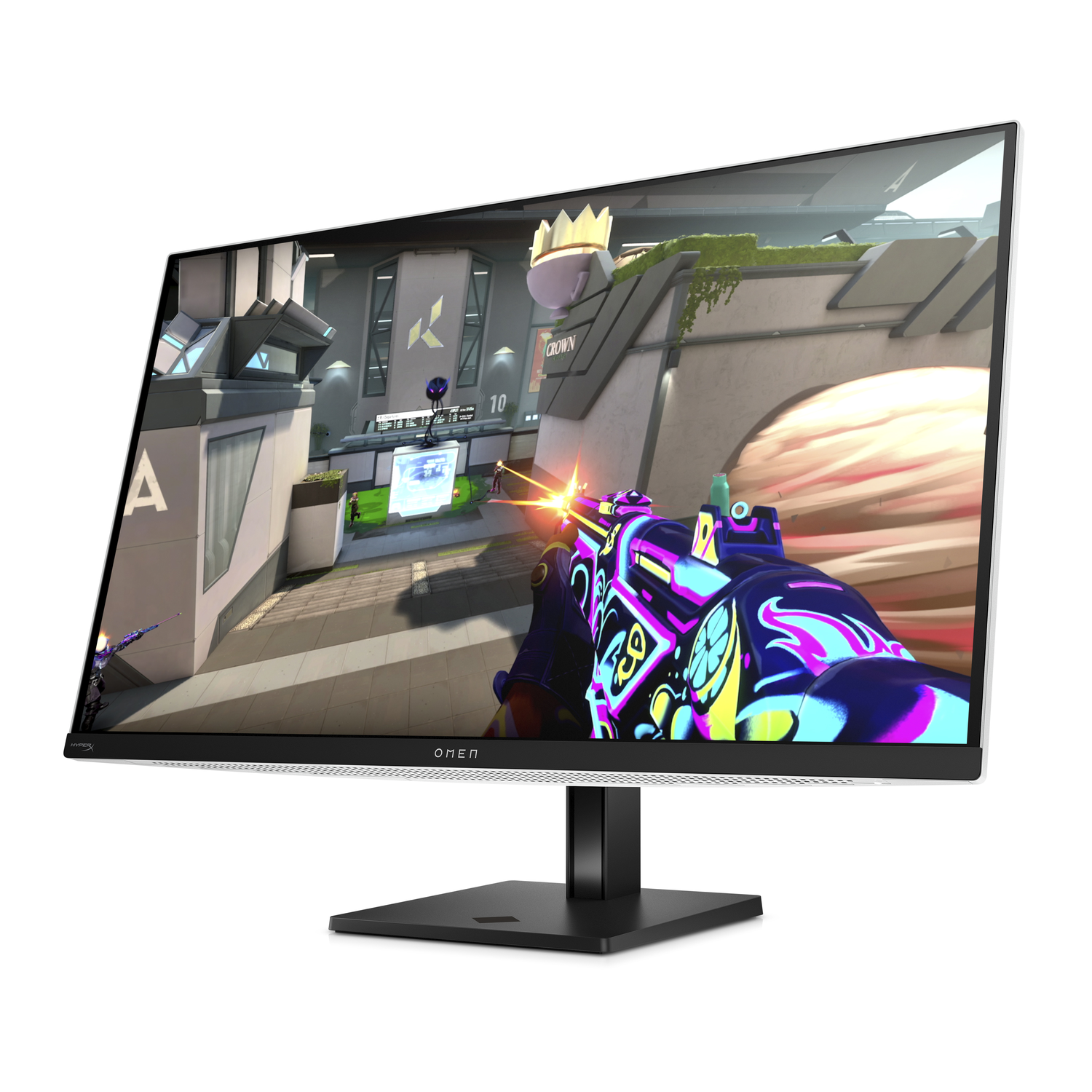A black monitor displays a colorful video game scene.