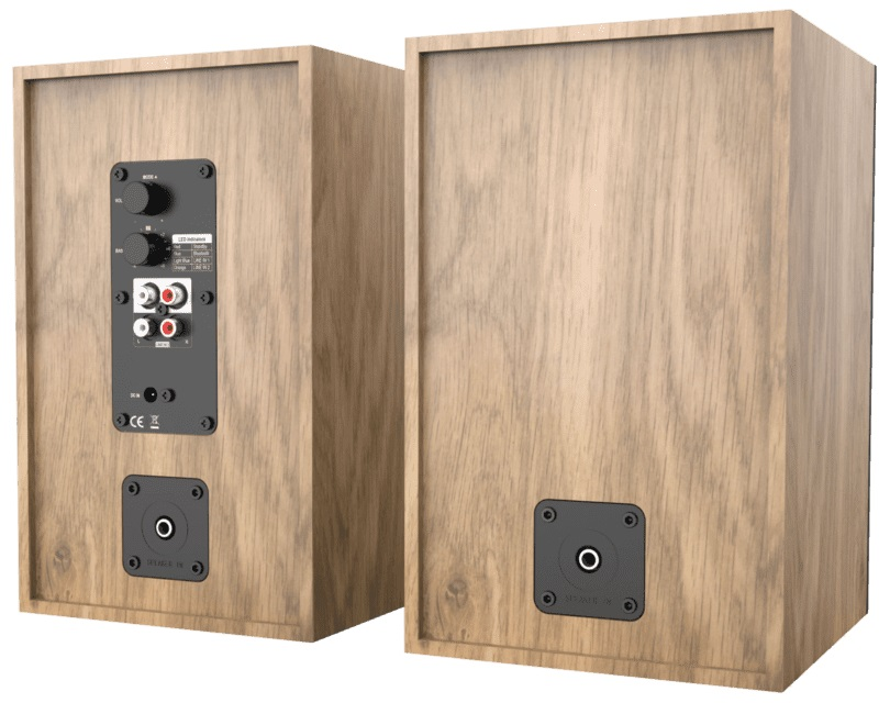 Dwa drewniane głośniki z czarnymi gniazdami.