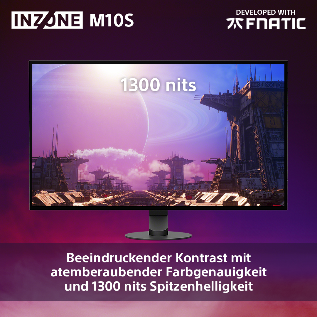 Ein Computermonitor zeigt eine futuristische Stadtszene. Der Text unten lautet: 'Beeindruckender Kontrast'.