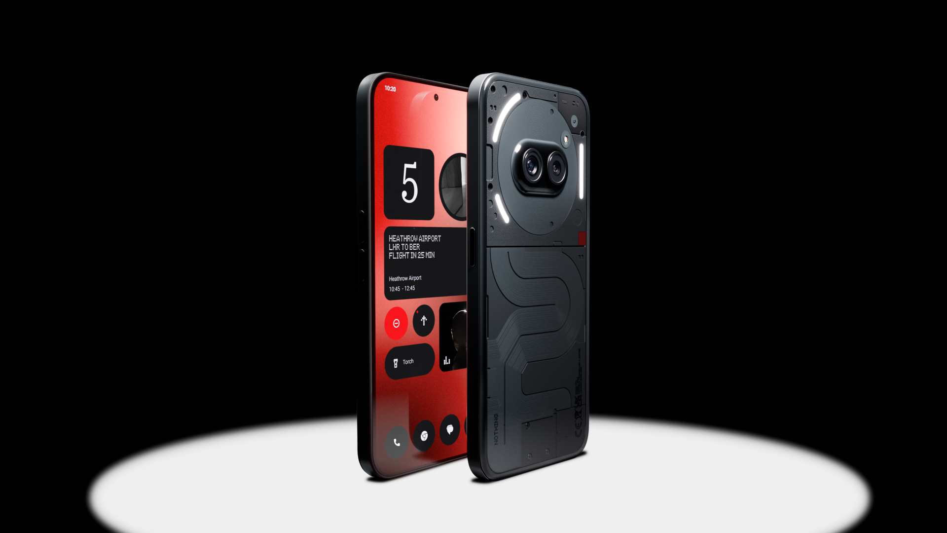 Ein schwarzes Telefon mit rotem Bildschirm wird neben einem transparenten Telefon angezeigt.