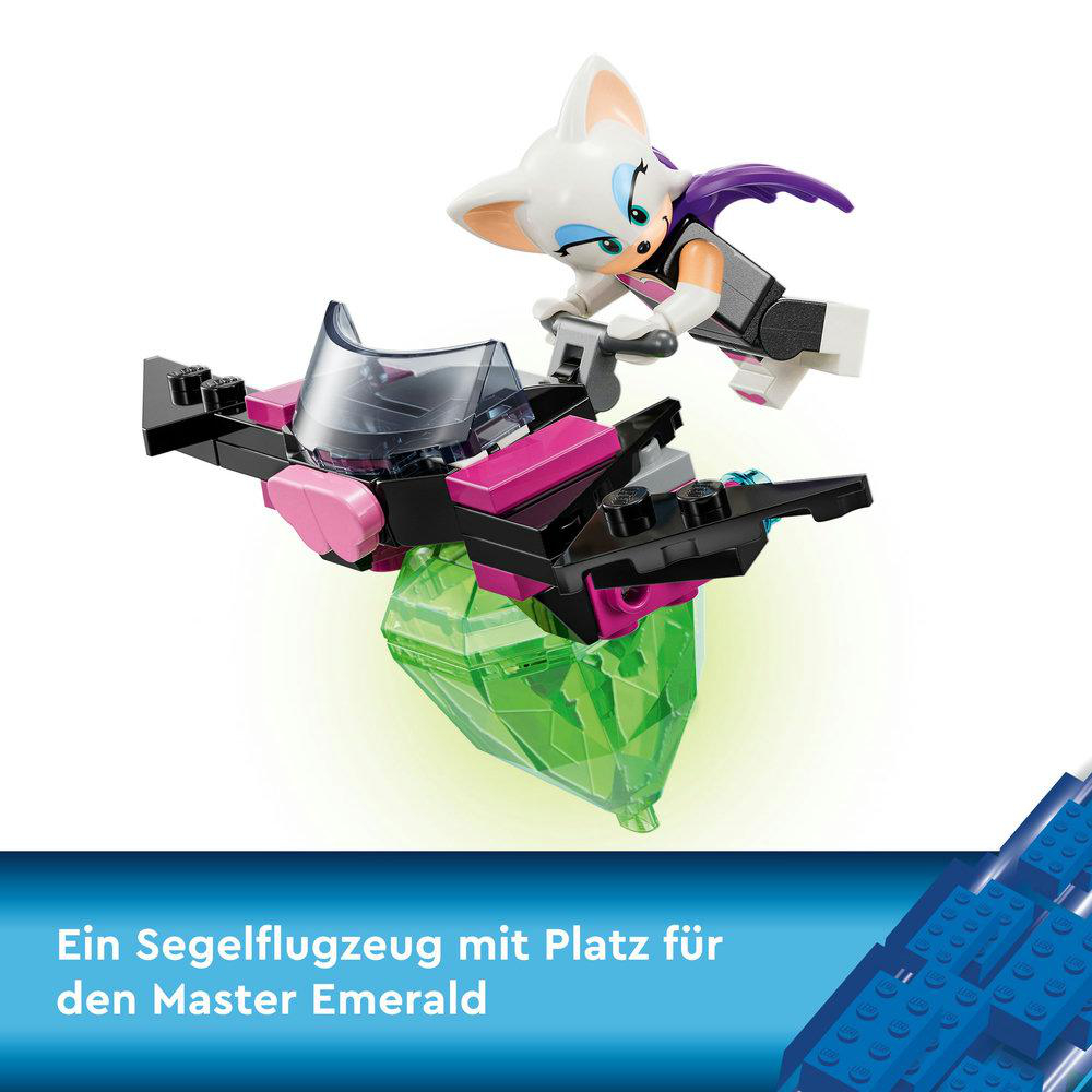 Lego-Set mit einer Figur in einem Fahrzeug. Ein grüner Edelstein ist im Vordergrund.