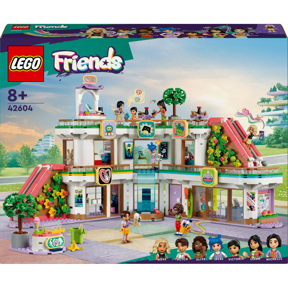 Lego Friends Box-Set mit einem Gebäude, Figuren und Zubehör. Das Gebäude hat mehrere Etagen und farbenfrohe Details.