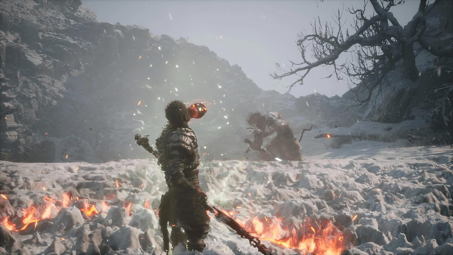 Una scena cupa e nevosa da un videogioco. Un personaggio con un bastone affronta una creatura in un ambiente nevoso.
