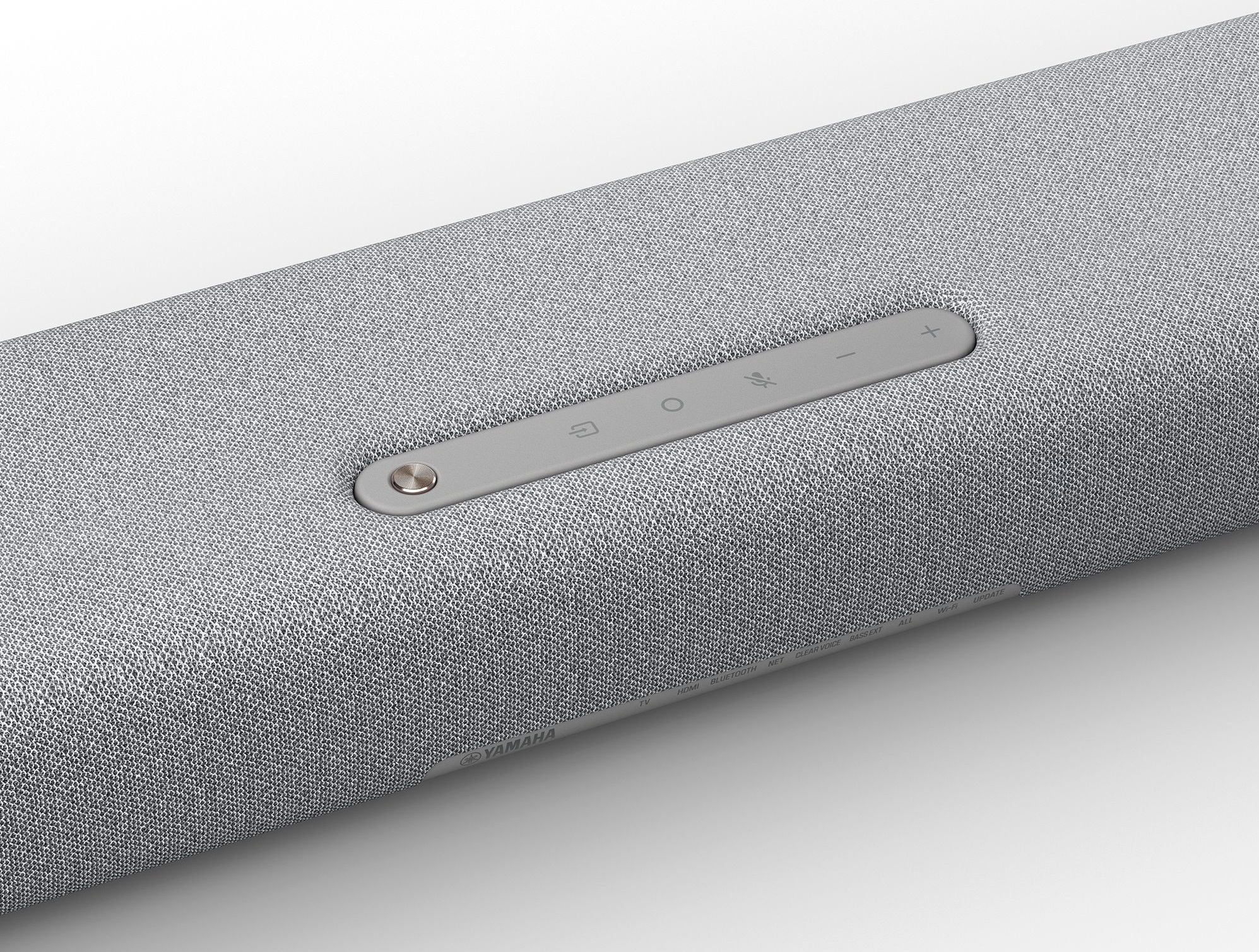 Jasnoszary soundbar z przyciskami i jasnym tłem.