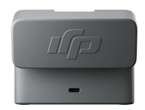 Szara skrzynka z portem USB-C. Na górze wklęsły obszar i wytłoczone logo.