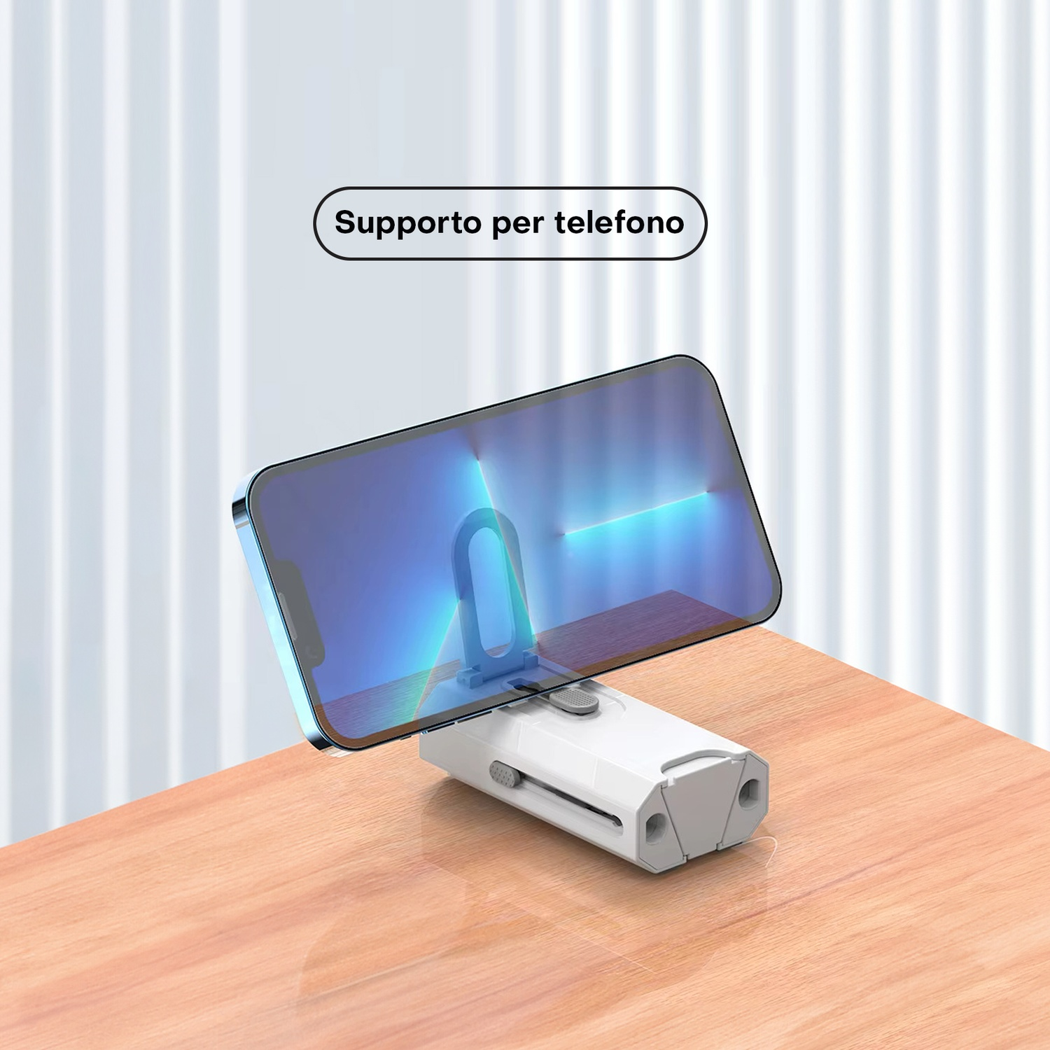 Un telefono su un supporto bianco su un tavolo di legno. Il testo 'Supporto per telefono' è visibile.