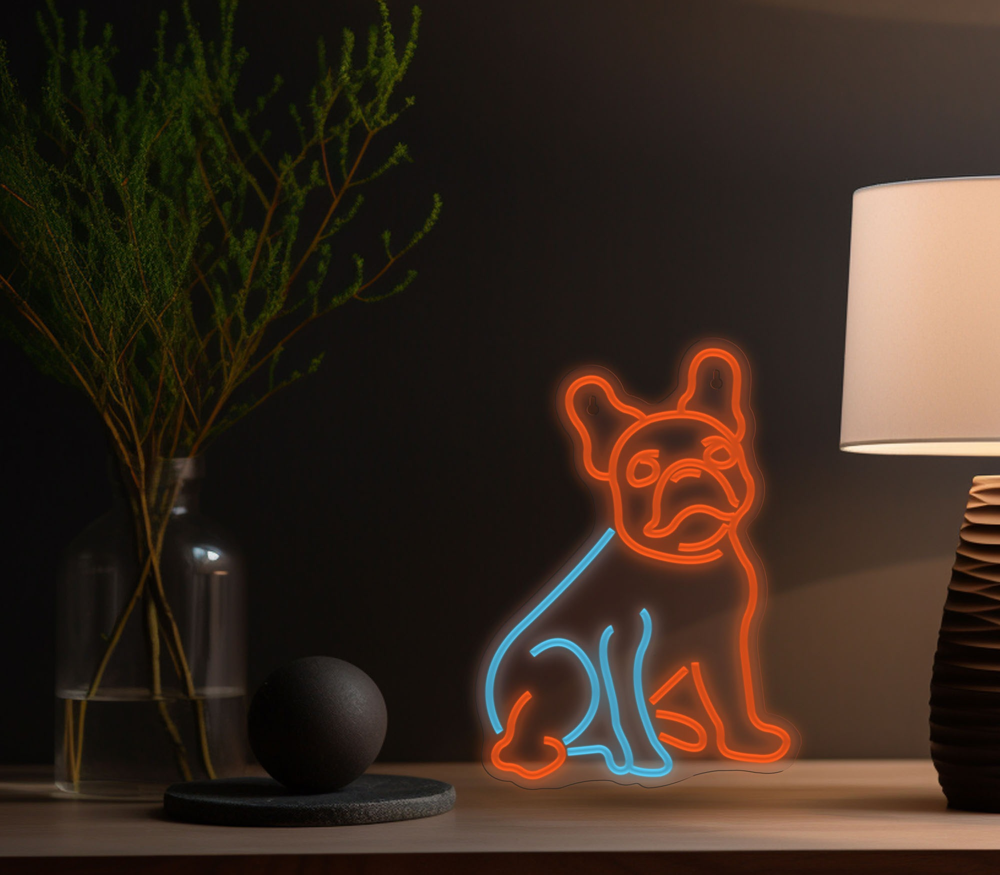 Neonowy znak psa, z pomarańczowym obrysem i niebieskim wnętrzem, stoi na stole.