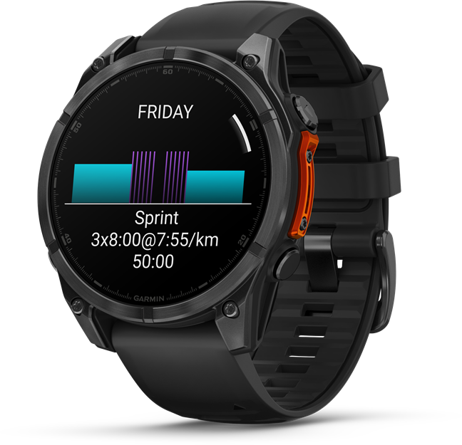 Garmin okosóra edzés kijelzővel, idővel, adatokkal, fekete szíjjal, narancssárga részletekkel.