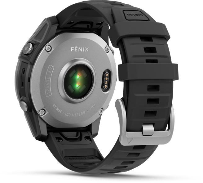 Garmin Fenix óra, hátsó nézet érzékelőkkel, fekete szíjjal és fém csattal.