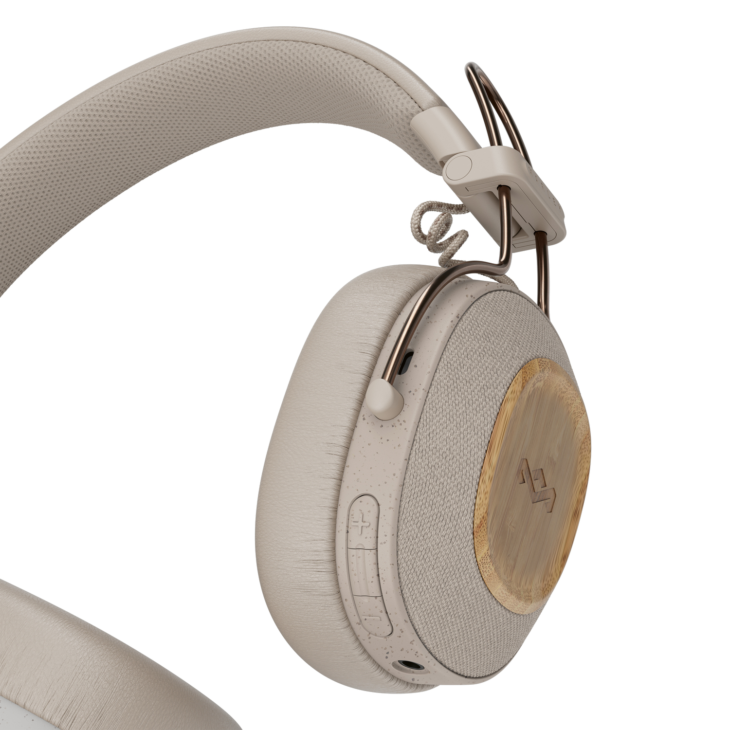 Casque audio couleur beige avec un détail en bois sur l'écouteur. L'arceau est courbé.