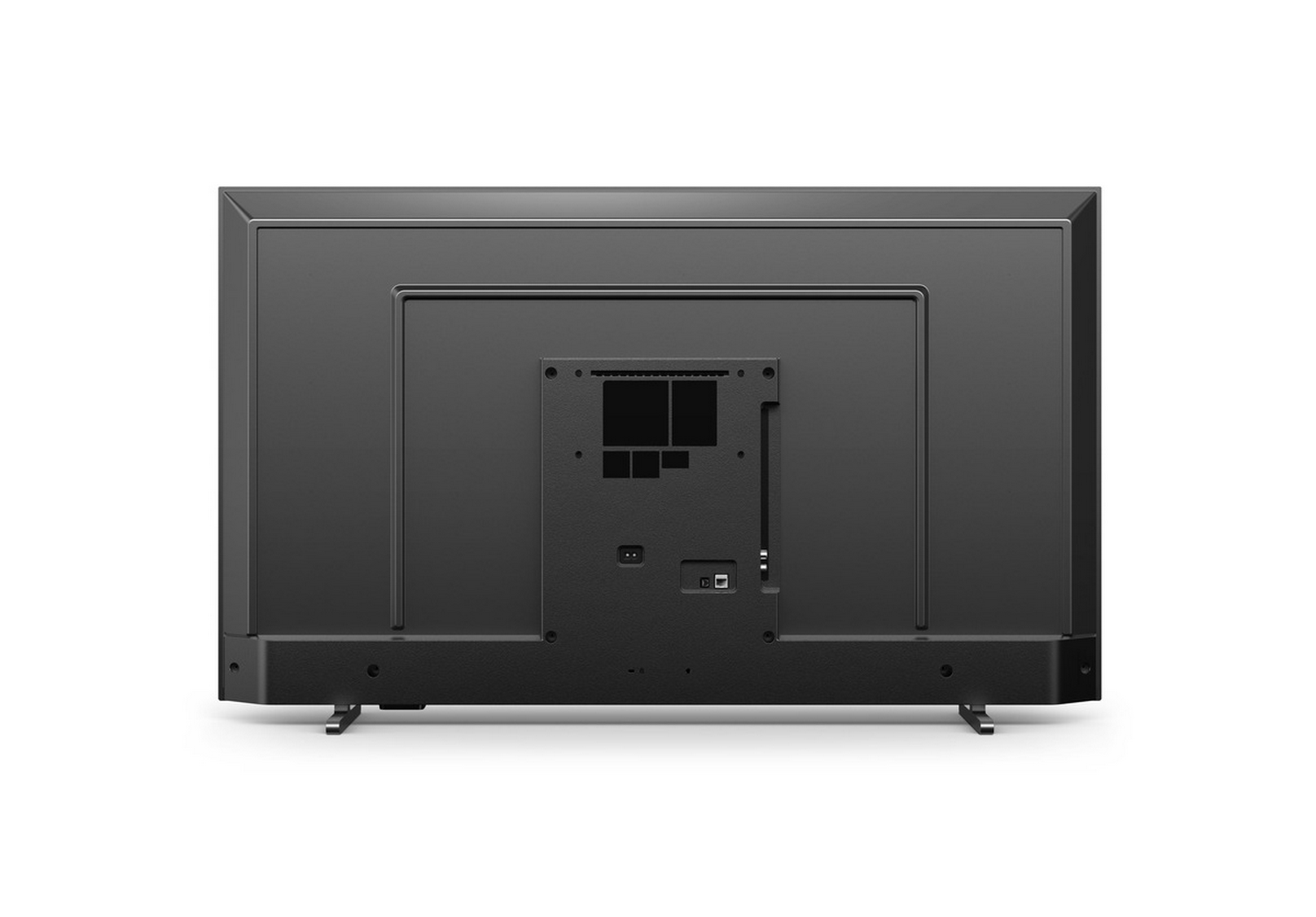 Parte trasera de un televisor negro. Hay puertos y un puerto USB. El televisor está en un soporte.