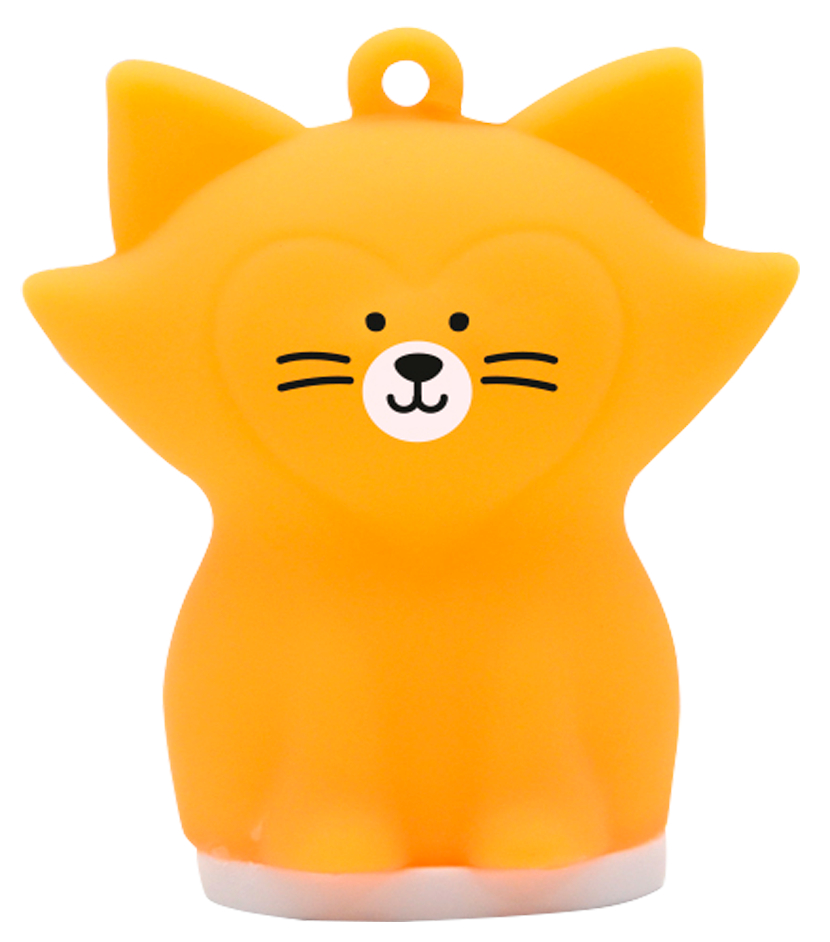 Pomarańczowa zabawka w kształcie kota z twarzą w kształcie serca, stojąca.