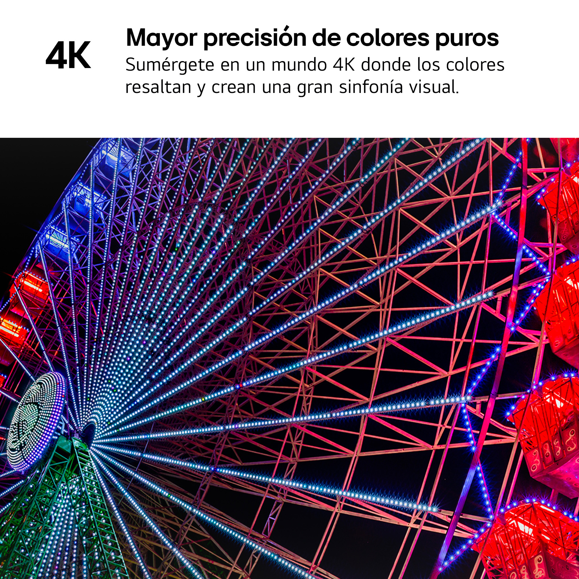 Una noria colorida por la noche.