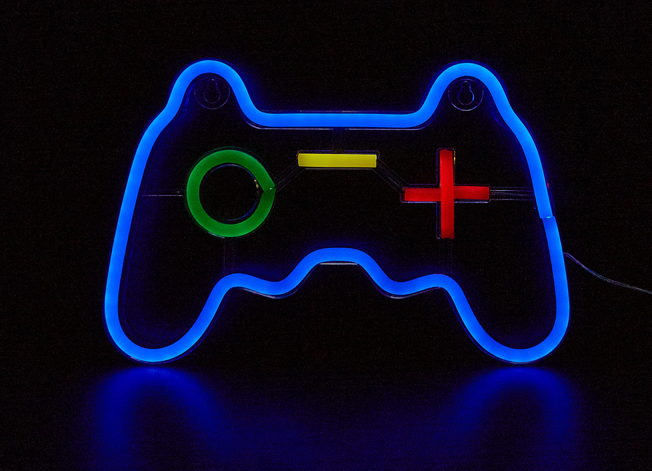 Ekran TV z interfejsem odtwarzacza muzyki. Mały głośnik poniżej.