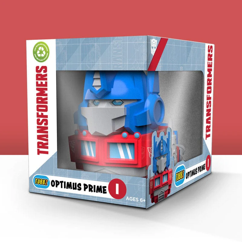 Transformers Optimus Prime játék egy dobozban, a karakter arca látható.