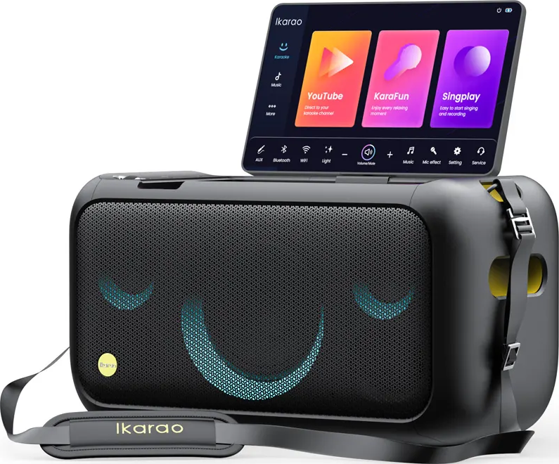 Machine de karaoké noire avec écran, haut-parleur et bandoulière.