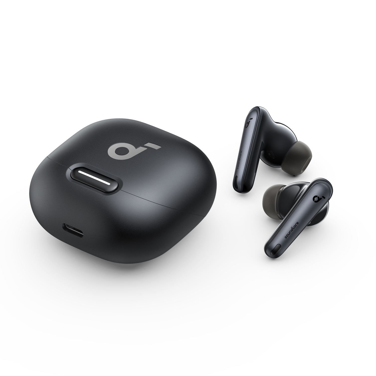 Écouteurs Soundcore noirs et étui de chargement. L'étui a un port de charge.